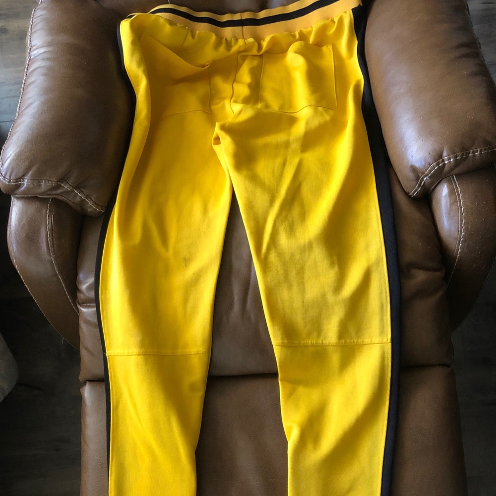 Yellow track pants